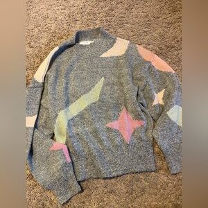 Fun multi print sweater!